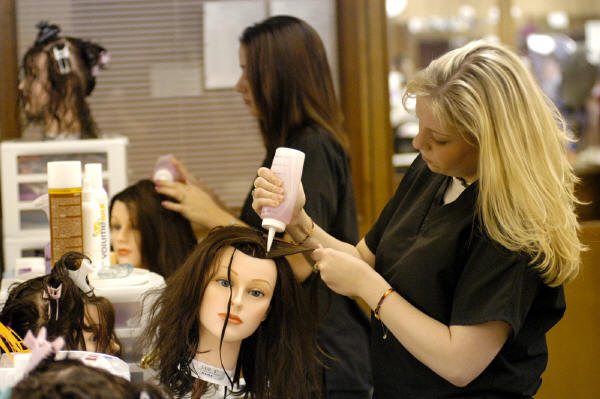 Strand College of Hair Design learning to color hair